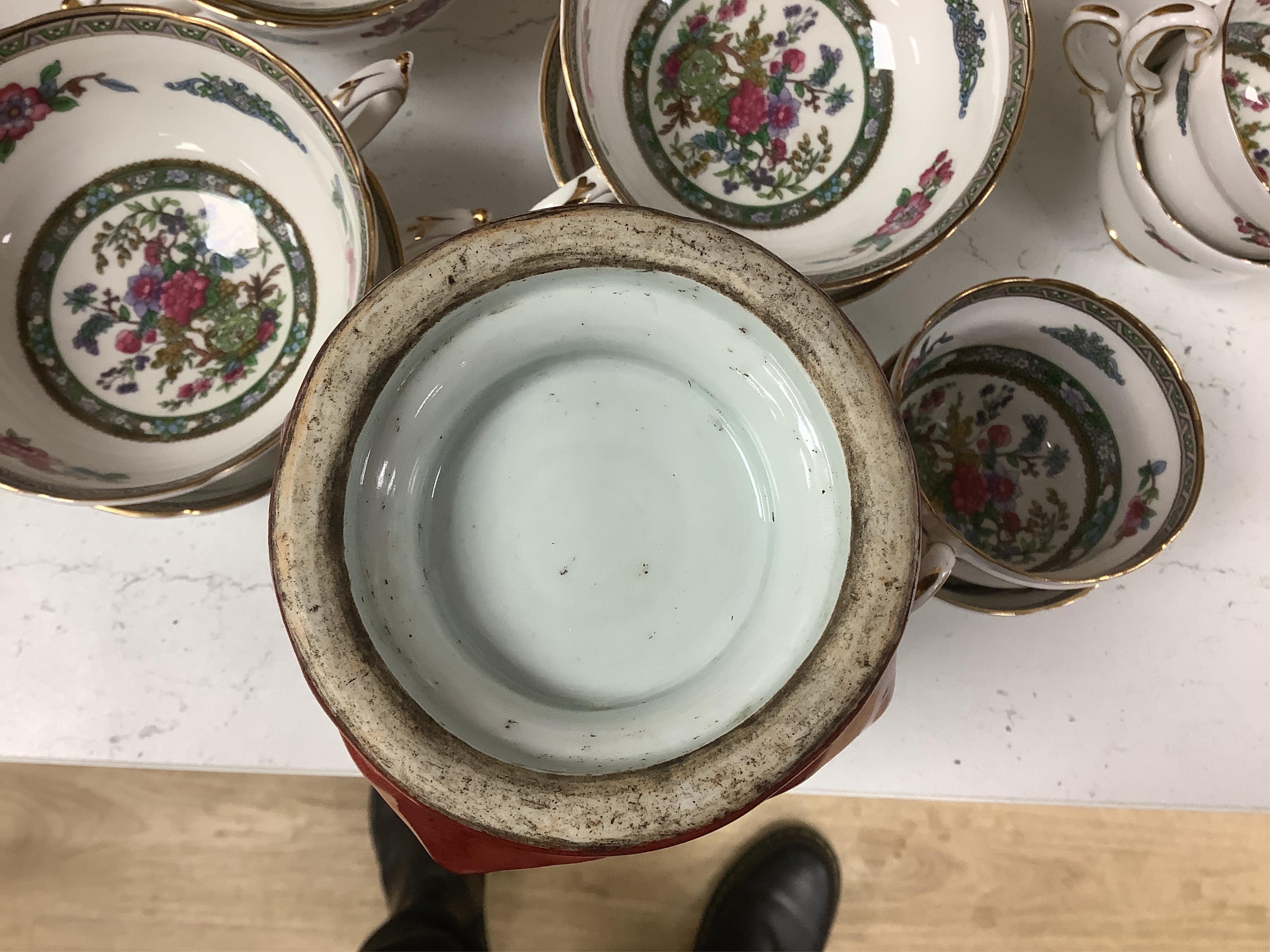 A Chinese red glazed elephant handled vase and a white glazed 'dragon' stem dish, tallest 18cm high. Condition - good